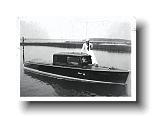 Foltis' Chris Craft speedboat moored at Taylor's dock, with Alex Nestor, skipper - taken in 1937. Boat new in 1937, destroyed in 1938 hurricane